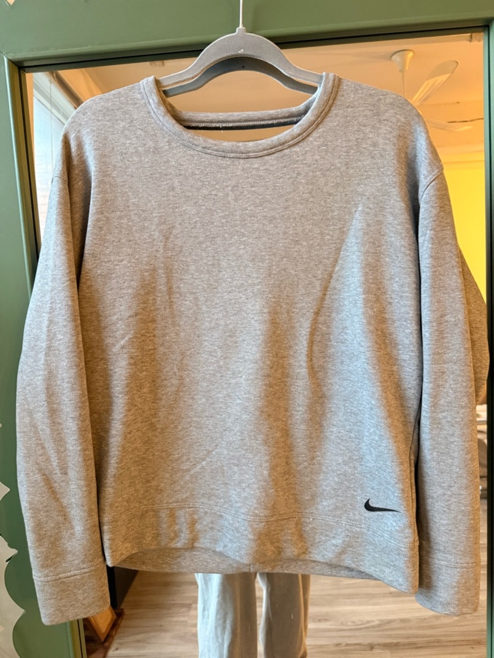 Nike Women's Heather Gray Crewneck Sweatshirt with Black Swoosh